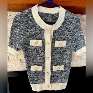 Adorable sweater with pearl buttons, never worn